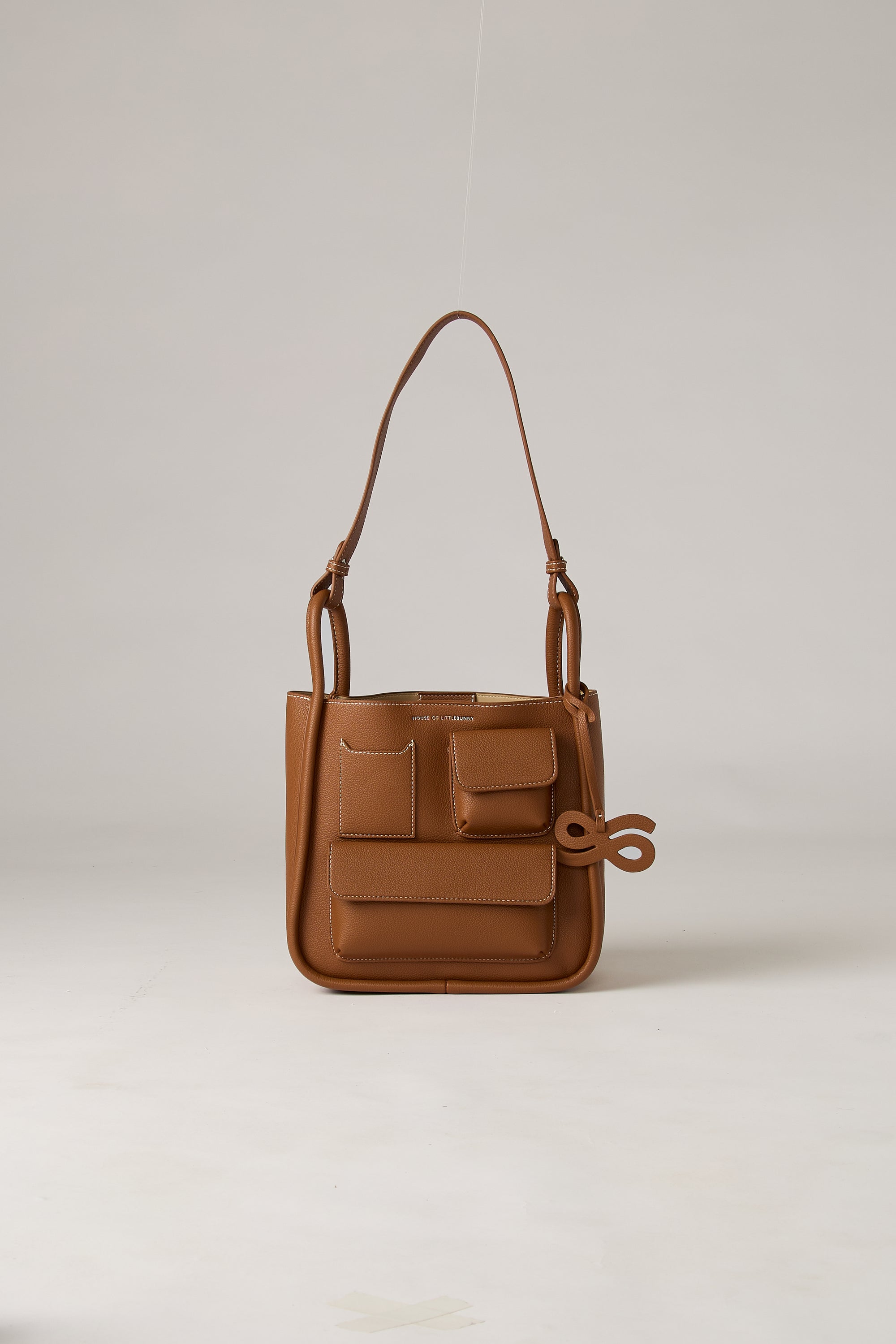 MOMENTUM JOURNEY PU BROWN, LARGE